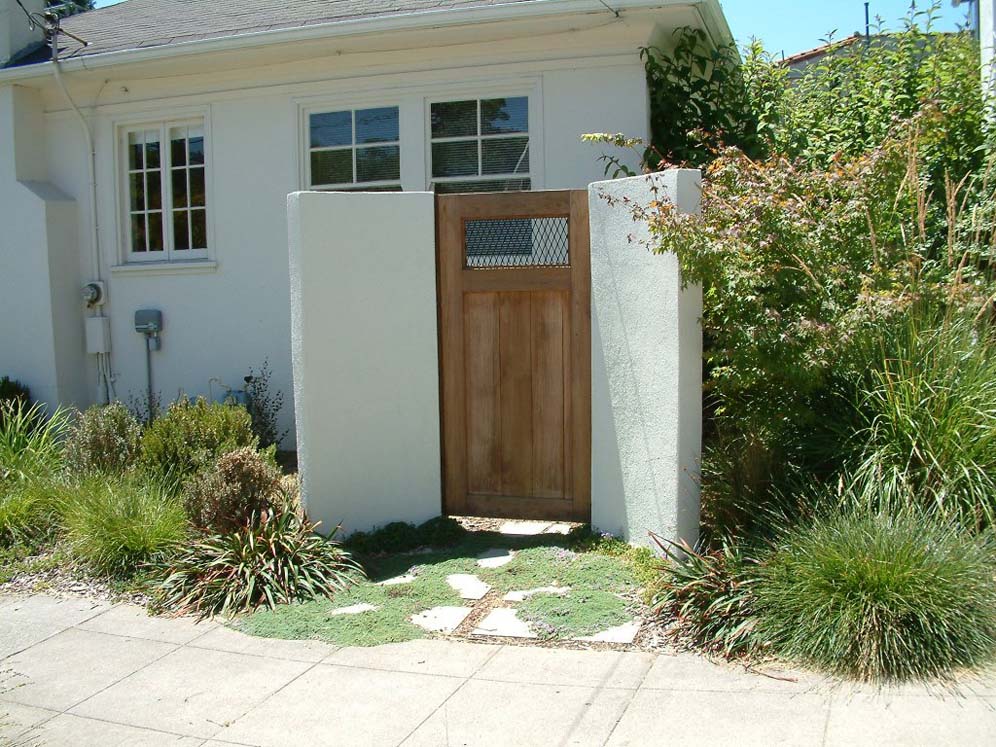 Gate Flanked By White